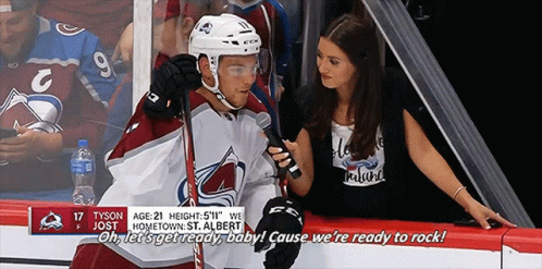 Hockey Player Number 17 Talking to Reporter
