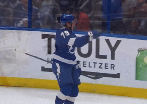 Hockey Player Number 19 on Ice