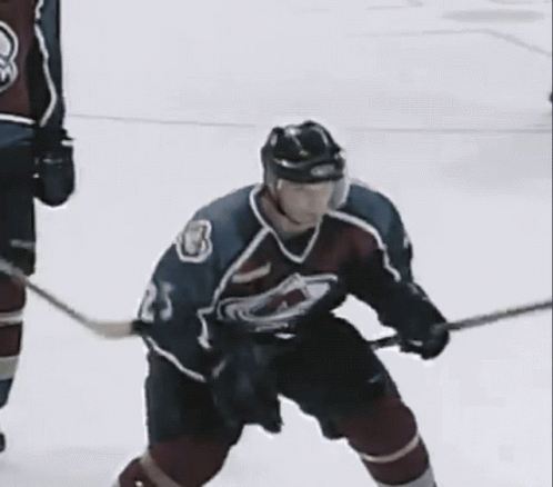 Hockey Player Number 2 Falling on Ice