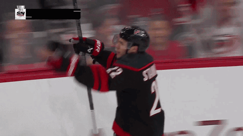 Hockey Player Number 2 Holding Stick GIF