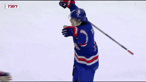Hockey Player Number 20 Hugging Another Player