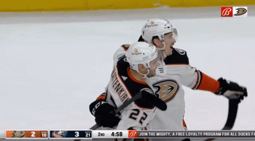 Hockey Player Number 22 Hugging GIF