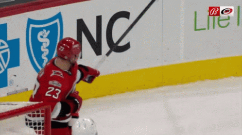 Hockey Player Number 23 on Ice