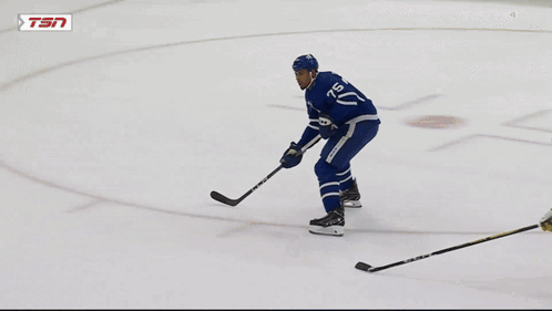 Hockey Player Number 25 on Ice