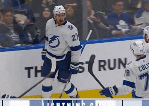 Hockey Player Number 27 Standing