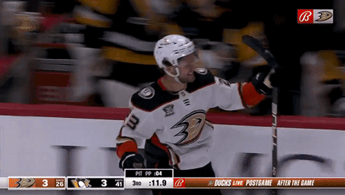 Hockey Player Number 3 Holding Stick GIF