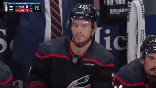 Hockey Player Number 33 in Stands