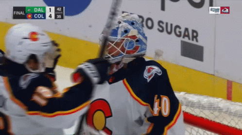 Hockey Player Number 40 Hugging Teammate
