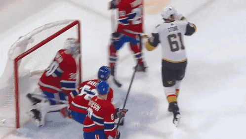 Hockey Player Number 61 on Ice
