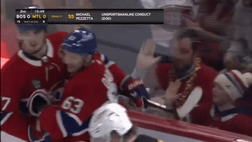 Hockey Player Number 63 Surrounded