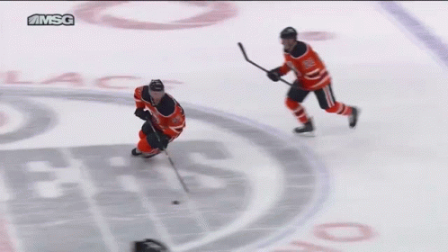 Hockey Player Number 7 Jumping Over Fence GIF