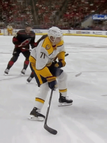 Hockey Player Number 71 Skating
