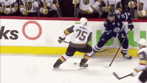 Hockey Player Number 75 Playing Defense