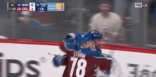 Hockey Player Number 78 Hugging Teammate GIF
