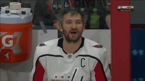 Hockey Player Number 8 Celebrates