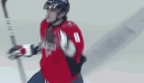 Hockey Player Number 8 Holding Hockey Stick