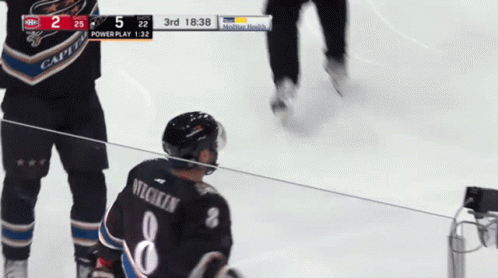 Hockey Player Number 8 on Ice