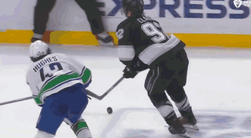 Hockey Player Number 9 Being Chased