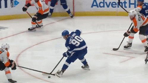 Hockey Player Number 90 Trying to Get Puck
