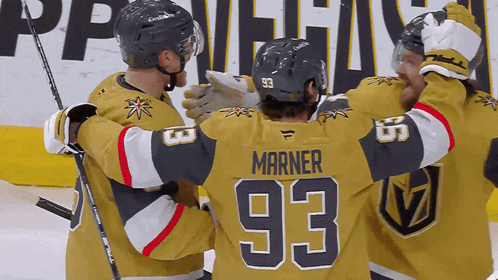 Hockey Player Number 93 Hugging Another Player
