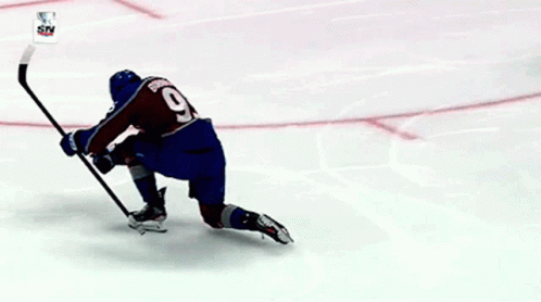 Hockey Player Number 93 Lying on Ice