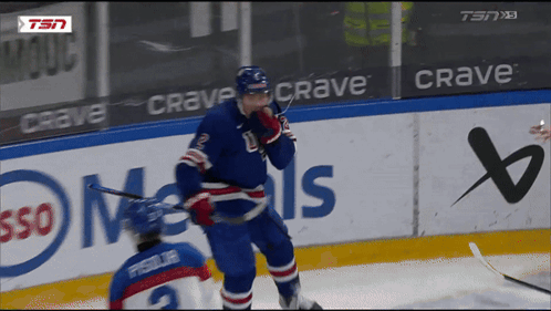 Hockey Player on Ice in Front of Crave Sign