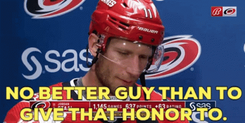 Hockey Player Red Helmet No Better Guy Than to Give That Honor To