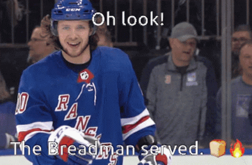 Hockey Player Smiling in The Breadman Served Jersey