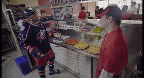 Hockey Player Talking To Pizza Maker GIF
