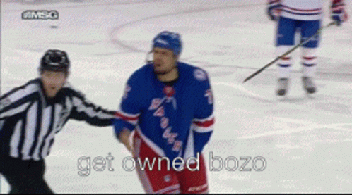 Hockey Player Talking to Referee Saying Get Owned Bozo