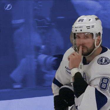 Hockey Player Wearing Bauer Helmet