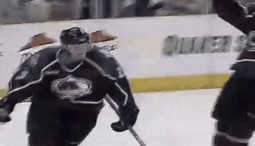 Hockey Player Wearing Denver Jersey