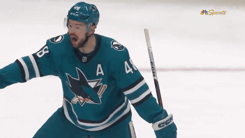 Hockey Player Wearing Jersey Saying A
