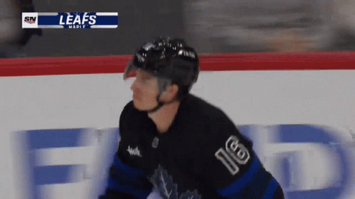 Hockey Player Wearing Number 16 GIF