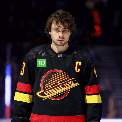 Hockey Player Wearing Number 3 Jersey