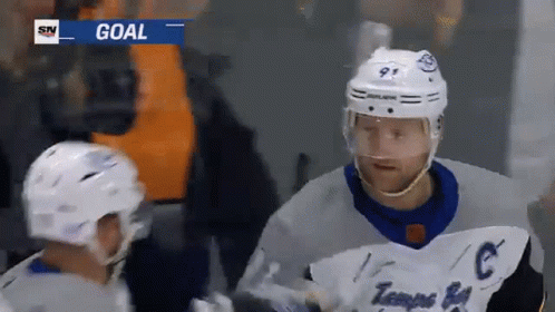 Hockey Player Wearing Number 9 Helmet