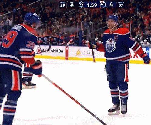 Hockey Player Wearing Number 9 Jersey GIF
