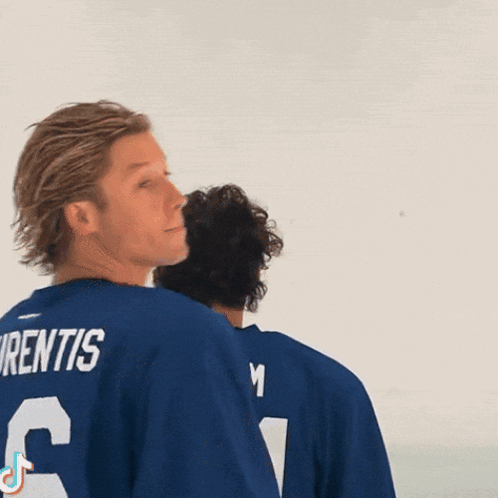 Hockey Player Wearing Warrior University Shirt