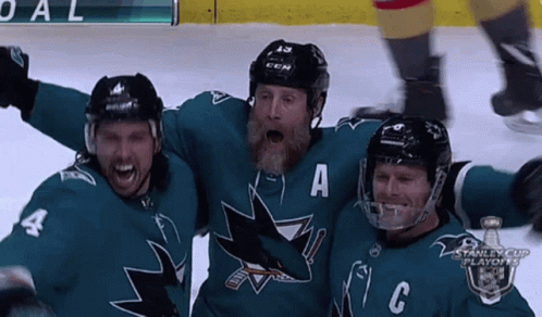 Hockey Player With A on Jersey and Two Others