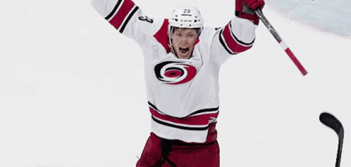 Hockey Player with Cares Helmet