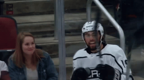 Hockey Player with Letter R on White Jersey