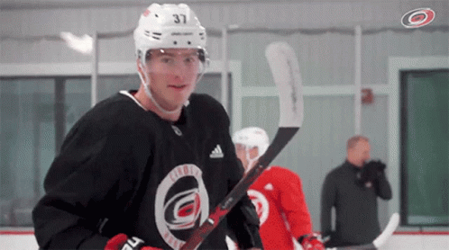 Hockey Player With Number 37 On Helmet GIF