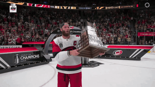Hockey Player With Trophy and Champions Banner