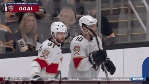 Hockey Players Celebrate Goal