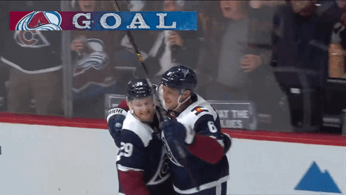Hockey Players Celebrate Goal