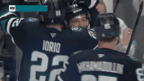 Hockey Players Celebrate Goal With SN Logo GIF
