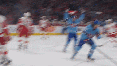 Hockey Players in Blue Jerseys