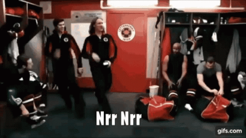 Hockey Players in Locker Room With NRR NRR