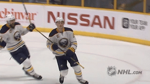 Hockey Players On Ice In Front Of Nissan GIF