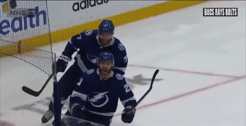 Hockey Players on Ice with NHL Logo